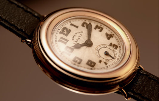 A detailed close-up of a vintage Rolex Oyster Perpetual, showcasing the timeless design of the first waterproof watch tested by Mercedes Gleitze.